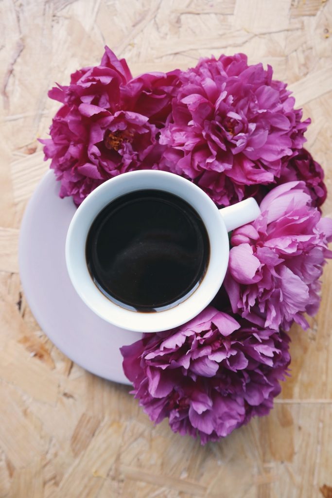 Coffee and a moment to enjoy the delight of a peony